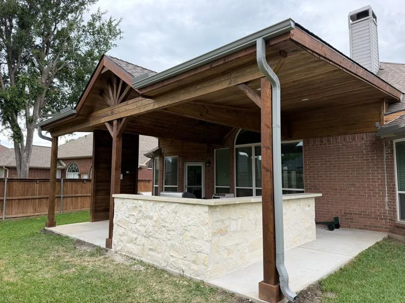 Attached gable patio cover with stone base