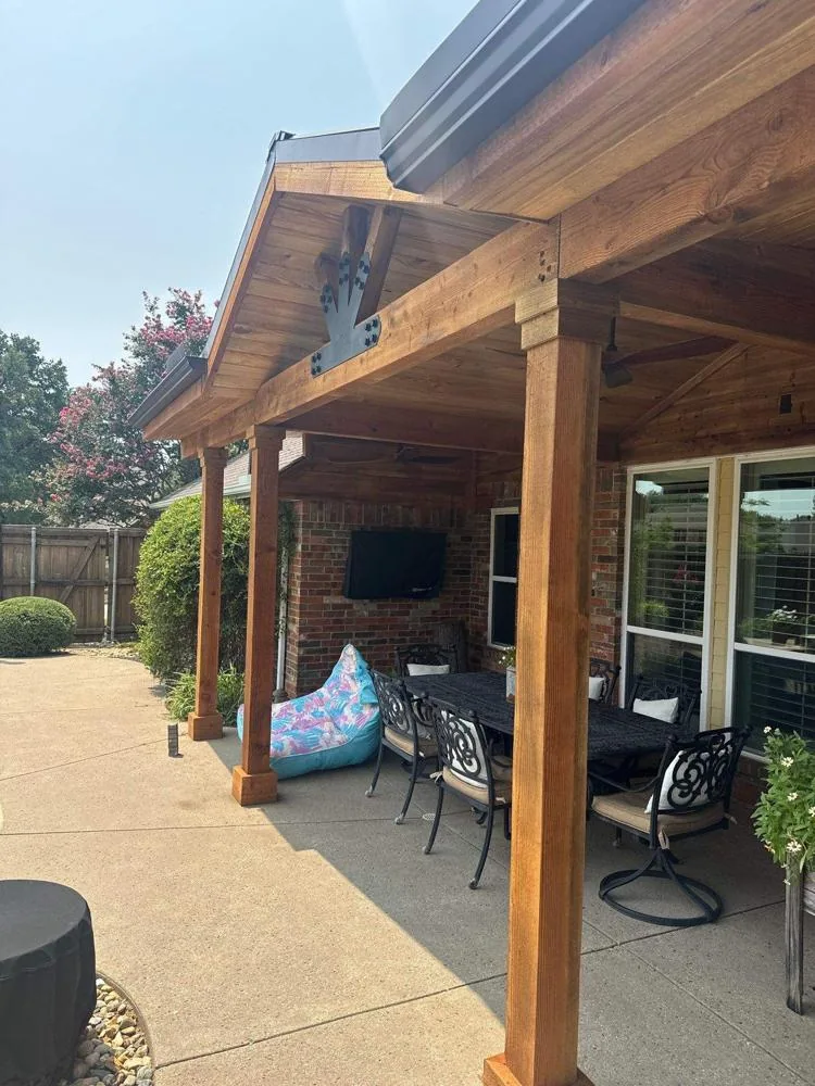 Covered patio with furniture and outdoor kitchen